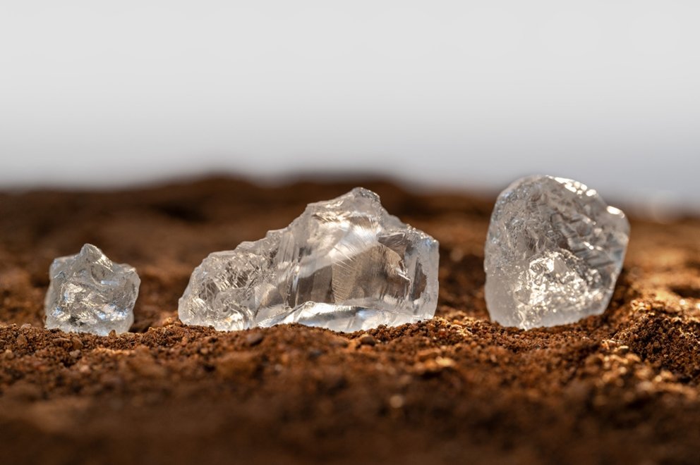Rough diamonds in sand 
