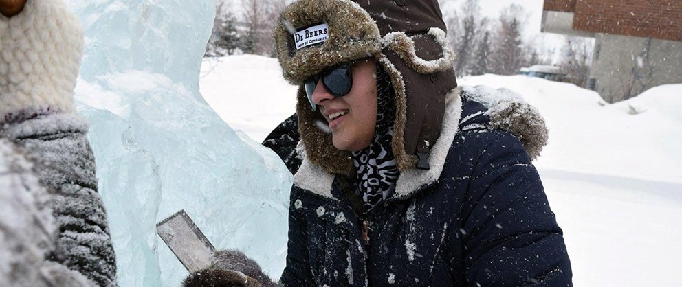 The Knucklebusters take home the trophy in the De Beers Inspired Ice High School Carving Challenge